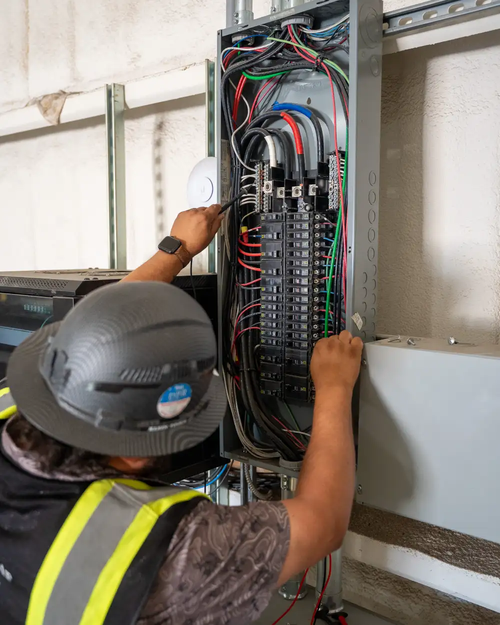 Licensed electricians providing electrical services including panels, wiring, and diagnostics